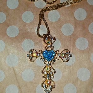 Beautiful gold and blue cross necklace